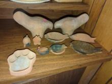 (LR) LOT OF CLAY MADE FIGURES OF ANIMALS AND DECOR, VARIED SIZES, 2 BIRDS, PIG. FROG. PAW PRINT.