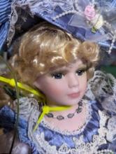 (GAR) Porcelain String Puppet Sitting on a Swing, Blonde Hair and Blue Eyed Doll Wearing a Blue