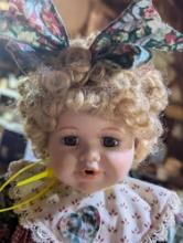 (GAR) Soft Expressions Porcelain Doll, Blonde Hair and Brown Eyed Doll Wearing a Green and Red