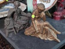 (LR) LOT OF (2) ANTIQUE SPELTER CAST METAL FIGURAL STATUES. ONE OF A COLONIAL PAINTER 9"W X 3-1/2"D