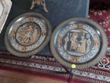 (LR) LOT OF (2) ETCHED COPPER/BRASS EGYPTIAN SCENE DECORATIVE WALL HANGING PLATES. THEY MEASURE