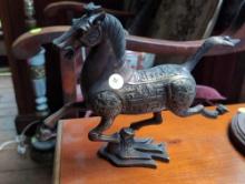 (LR) OLD CHINESE BRONSE DYNASTY HORSE STEPPING ON A FLYING SWALLOW. VERY NICE DETAILING, GOOD