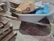 Wheel barrow plastic Bentwood Supplies with concrete and ice melt