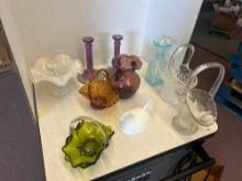 Nice, colorful glassware, a lot ruffled basket, pedestal bowl, candlesticks, faces, etc. Marano