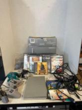 PlayStation 2 with box, cords, three controllers, nine games, memory cards