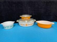 Four Pyrex casserole dishes
