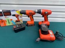 Two Black and Decker 20 Volt Drill/Drivers With Batteries and Charger