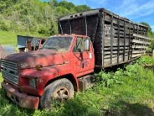 Ford 700, 5 & 2 sp, 20' bed, AS IS