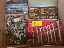 assortment of sockets and wrenches