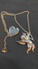 Necklace with Bell charm & heart and cupid pins