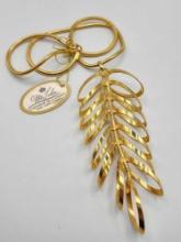 Vintage Mr John gold toned articulated drop necklace