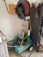 Speedaire air compressor with accessories and retractable hose reel