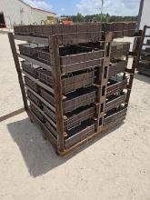 Rack of Batch Oven Baskets and Metal Container of