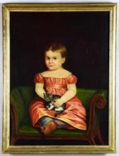 PORTRAIT OF A YOUNG GIRL WITH A KITTEN.
