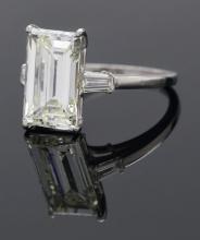 MAGNIFICENT 6.11CT EMERALD CUT DIAMOND RING