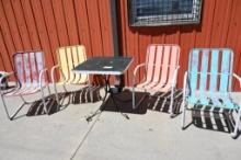 Vintage Patio Table with Four Metal Chairs